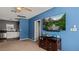 A living room featuring a TV and a view into the kitchen at 432 Bonelli Ave, Overton, NV 89040