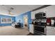 A living room view with kitchen in background at 432 Bonelli Ave, Overton, NV 89040