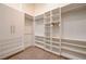 Walk-in closet has custom shelving and ample space for clothing and accessories at 4515 Dean Martin Dr # 200, Las Vegas, NV 89103