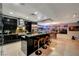 Contemporary kitchen with black cabinets, a central island, and bar stool seating at 4515 Dean Martin Dr # 200, Las Vegas, NV 89103