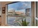 Picture window showcasing a beautiful city view at 4515 Dean Martin Dr # 200, Las Vegas, NV 89103