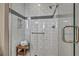 Walk-in shower featuring tiled walls and a glass door at 500 Pear Lake St, Las Vegas, NV 89138
