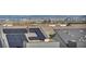 Eco-friendly home featuring roof-mounted solar panels and a stunning view of the city skyline at 500 Pear Lake St, Las Vegas, NV 89138