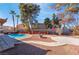 Backyard featuring a pool, mature trees, and a pergola at 5111 Rudy Ln, Las Vegas, NV 89120