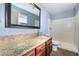 Bathroom featuring granite counters, tile floor, and shower stall at 5111 Rudy Ln, Las Vegas, NV 89120