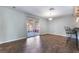 Open dining area with sliding glass door and breakfast bar seating at 5111 Rudy Ln, Las Vegas, NV 89120