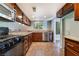 Modern kitchen with stainless steel appliances and granite countertops at 5111 Rudy Ln, Las Vegas, NV 89120