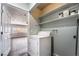 Laundry room with washer and shelving for storage at 5111 Rudy Ln, Las Vegas, NV 89120