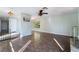 Open living room featuring tile flooring, neutral paint, and contemporary lighting at 5111 Rudy Ln, Las Vegas, NV 89120