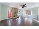 Sun-filled living room showcasing a brick fireplace and tiled floors at 5111 Rudy Ln, Las Vegas, NV 89120