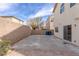 Spacious backyard featuring concrete, gravel, and a brick perimeter wall at 5596 Danforth Ave, Las Vegas, NV 89141