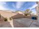 Spacious backyard featuring concrete, gravel, and a brick perimeter wall at 5596 Danforth Ave, Las Vegas, NV 89141