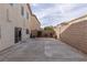 Spacious backyard featuring concrete, gravel, and a brick perimeter wall at 5596 Danforth Ave, Las Vegas, NV 89141