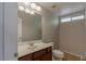 Bathroom with modern vanity, toilet, and window at 5596 Danforth Ave, Las Vegas, NV 89141