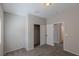 Neutral bedroom featuring carpet, lighting, closet and hallway at 5596 Danforth Ave, Las Vegas, NV 89141