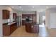 Spacious kitchen featuring stainless appliances and granite island at 5596 Danforth Ave, Las Vegas, NV 89141