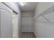 Walk-in closet with carpet, wire shelving, and lighting fixture at 5596 Danforth Ave, Las Vegas, NV 89141