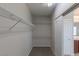 Walk-in closet with carpet, wire shelving, and lighting fixture at 5596 Danforth Ave, Las Vegas, NV 89141