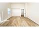 Cozy bedroom with wood-look flooring and natural light at 5829 Aqua Verde St, North Las Vegas, NV 89031