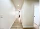 Hallway features wood-look floors and white walls at 5829 Aqua Verde St, North Las Vegas, NV 89031