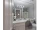 Well-lit bathroom with a vanity, a toilet, and a shower/tub combination at 6250 W Flamingo Rd # 7, Las Vegas, NV 89103