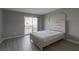 Bright bedroom with sliding glass door leading to a balcony at 6250 W Flamingo Rd # 7, Las Vegas, NV 89103