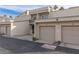 Condo exterior featuring private parking, garages and well-maintained landscaping at 6250 W Flamingo Rd # 7, Las Vegas, NV 89103