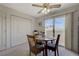 Inviting dining area features a sliding glass door and is conveniently located near a closet for additional storage at 691 Anne Ln # 0, Henderson, NV 89015