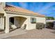 Charming single-story home featuring a cozy front porch area with desert landscaping and a tiled roof at 691 Anne Ln # 0, Henderson, NV 89015