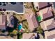 Aerial view of a residential neighborhood featuring homes with pools and landscaped yards at 746 Royal Course Ct, Las Vegas, NV 89148