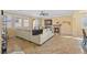 Living room boasts tile floors, a fan, a fireplace, and plantation shutters at 746 Royal Course Ct, Las Vegas, NV 89148