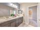 Elegant bathroom with a dual sink vanity, and modern finishes at 7812 Alola Springs Ln # Lot 1, North Las Vegas, NV 89084