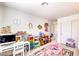 Bright bedroom featuring play area and study space at 7848 Desert Bell Ave, Las Vegas, NV 89128