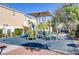 Community playground with slides and climbing equipment with nearby benches at 8235 Misty Sage St, Las Vegas, NV 89139