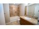 Bathroom with tile floor, a tub, and vanity at 8255 Las Vegas Blvd # 415, Las Vegas, NV 89123