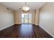 Bright living room featuring hardwood floors and sliding glass doors to balcony at 8255 Las Vegas Blvd # 415, Las Vegas, NV 89123