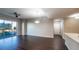 Spacious and bright living room featuring wood floors and a balcony at 8255 Las Vegas Blvd # 415, Las Vegas, NV 89123