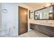 Modern bathroom with a sleek vanity, contemporary fixtures, and ample counter space at 8925 W Flamingo Rd # 110, Las Vegas, NV 89147