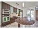 Contemporary kitchen with stainless steel appliances and curved island at 8925 W Flamingo Rd # 110, Las Vegas, NV 89147