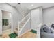 Bright and airy foyer featuring a staircase, front door and hardwood floors at 9151 Mount Wilson St, Las Vegas, NV 89113