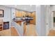 A view of the kitchen with light wood cabinets and stainless steel appliances at 9151 Mount Wilson St, Las Vegas, NV 89113