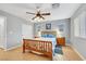 Inviting main bedroom with ceiling fan, bedside tables, and natural lighting at 9151 Mount Wilson St, Las Vegas, NV 89113