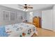 Sunny main bedroom with wood flooring, dresser, and lots of natural light at 9151 Mount Wilson St, Las Vegas, NV 89113