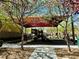 Community playground with shade canopy, climbing structure, and slide set in a safe rubber surface at 9151 Mount Wilson St, Las Vegas, NV 89113