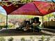 Playground with shade canopy, climbing structure, and slide set in a safe rubber surface at 9151 Mount Wilson St, Las Vegas, NV 89113