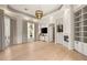 Bright living room featuring a fireplace, custom cabinets, and plenty of natural light at 9825 Glenrock Dr, Las Vegas, NV 89134