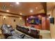 Home theater featuring a large screen, leather recliners, and professional surround sound system at 9825 Glenrock Dr, Las Vegas, NV 89134