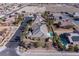 An aerial view captures a beautiful single-Gathering home, complemented by a large pool and desert landscaping at , Las Vegas, NV 89149