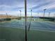 Multiple well-maintained tennis courts with modern lighting and shade structures at 4830 Byzantine Ct, Las Vegas, NV 89149