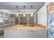Bright kitchen with a gray cabinets, stainless steel appliances and a large granite-topped island at 1301 E St Louis Ave # C, Las Vegas, NV 89104